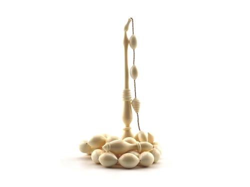 A rosary made of walnut ivory, sturdy turned.