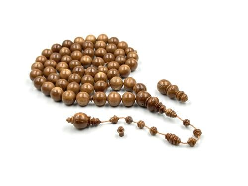 A rosary made from coconut fruit, by Muhammad Abu Ziad, the art factory.