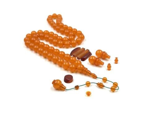 Faturan rosary made of Yemeni cubes, color and transparency, antique casting, Aqeel Al-Turki lathe work.