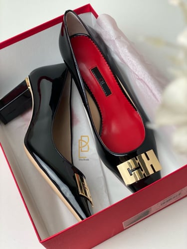 جزمة كارولينا هيريرا