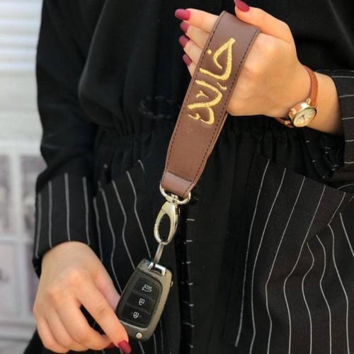 ميدالية مفاتيح جلد بالإسم