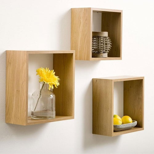 رف حائط مكعب لون ذهبي