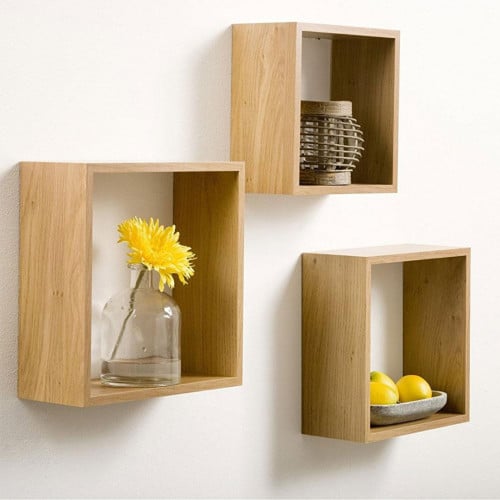 رف حائط مكعب لون ذهبي