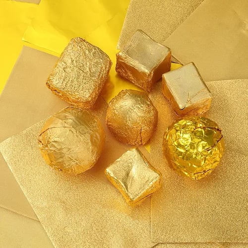 رول لف الشوكلاته قصدير ذهبي وجهبن