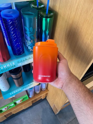 كوب ستاربكس برتقالي تشكيله الصيف