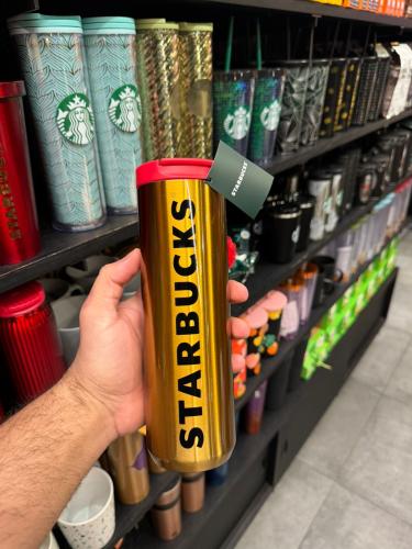 مق ستاربكس ذهبي بغطاء احمر