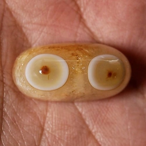 حجر عقيق سليماني هندي طبيعي أصلي برتقالي عينين داخ...