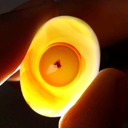 حجر عقيق سليماني هندي طبيعي لونين عين بنقطة حمراء