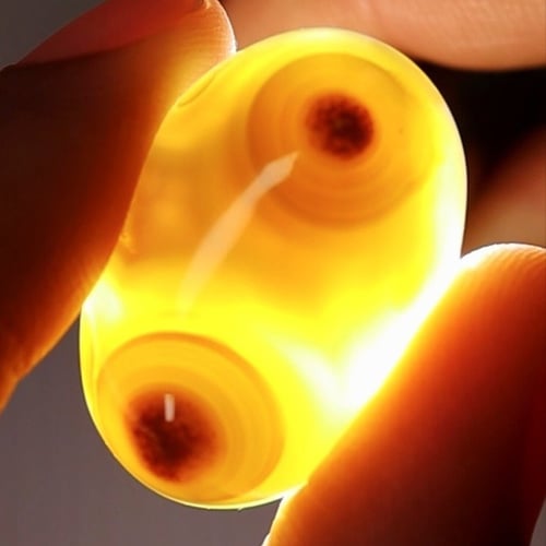 حجر عقيق سليماني هندي طبيعي أخضر عينين داخلها نقطة...