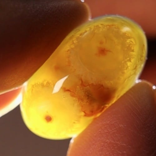 حجر عقيق سليماني هندي طبيعي عينين فلور داخل كل عين...