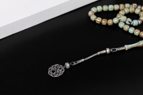 بكلايت فيروزي بالفضة