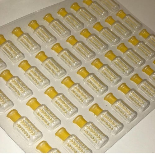 ترانسفير بشكل دهن العود ذهبي و أبيض