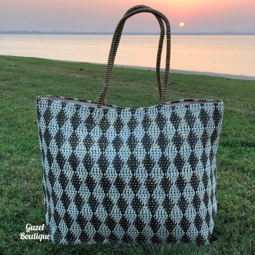 شنطة رحلات - ذهبي