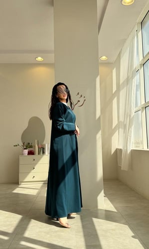 عباية نص كلوش كريب لمياء تركواز مع كلفة اسود