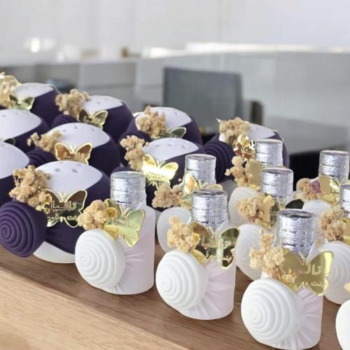 بكج مكون من 24 قطعة (12 عطور ميني - 12 مباخر) منسق...