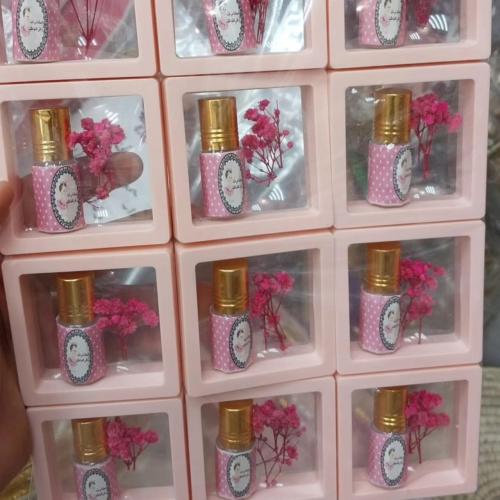 توزيعات مواليد برواز شفاف (12 قطعة) يحتوى على تولة...