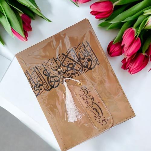 مجموعة من 12 قطعة من غلاف جلدي للمصحف مع فاصل بالل...