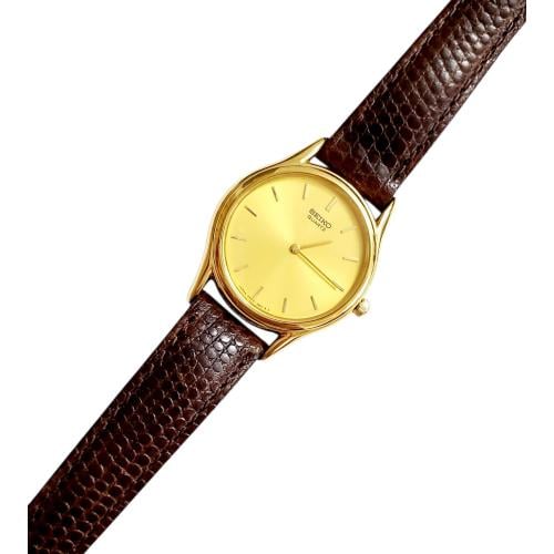 ساعة سيكو الرقيقة انالوج كوارتز المميزة (thin watch) 24mm مينا ذهبي حزام جلد فاخر لون عودي للنساء - Vintage S8
