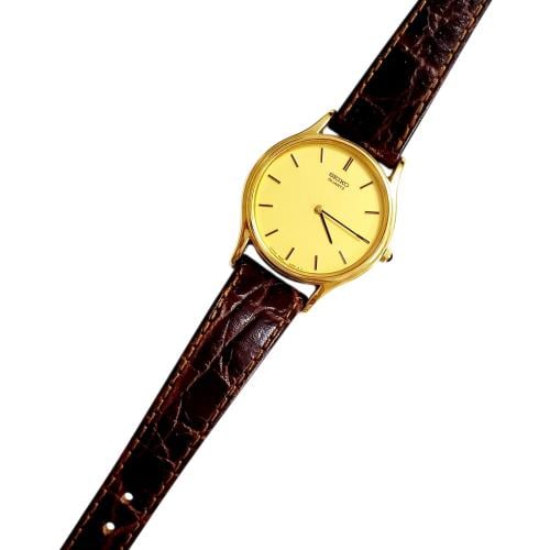 ساعة سيكو الرقيقة انالوج كوارتز المميزة (thin watch) 26mm مينا ذهبي حزام جلد فاخر لون عودي للنساء - Vintage S2