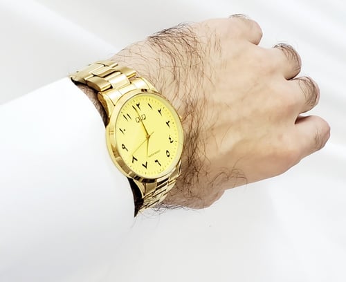 ساعة كيو آند كيو Q&Q الرقيقة كوارتز انالوج ( أرقام...