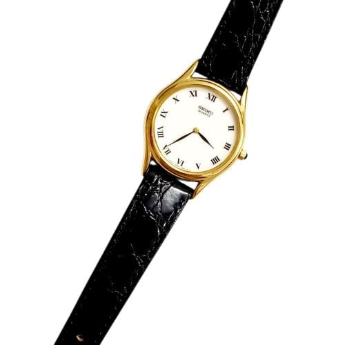 ساعة سيكو الرقيقة انالوج كوارتز المميزة (thin watch) 24mm مينا أبيض أرقام روماني حزام جلد فاخر لون اسود للنساء - Vintage S6