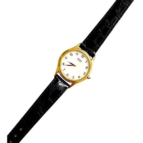 ساعة سيكو الرقيقة انالوج كوارتز المميزة (thin watch) 24mm مينا أبيض أرقام انجليزية حزام جلد فاخر لون اسود للنساء - Vintage S4