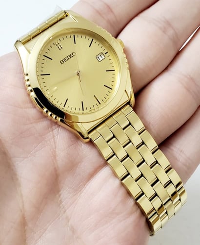 Seiko Men's gold Stainless Steel 34mm Analog Quart...