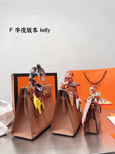 شنطة ارمز كيلي باكسسوارات ذهبي ( باحجام متعدده )