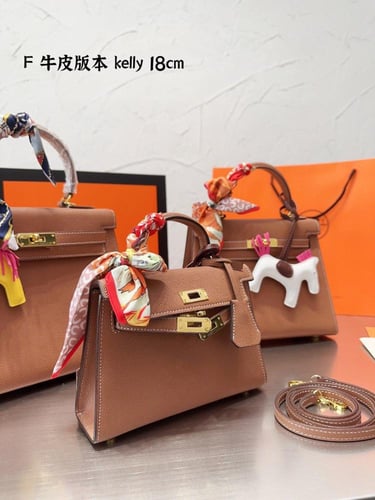 شنطة ارمز كيلي باكسسوارات ذهبي ( باحجام متعدده )