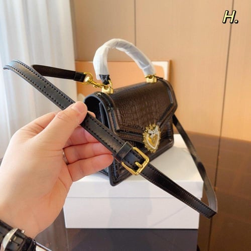 شنطة دولشي اند غابانا فضي