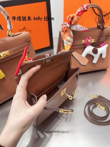 شنطة ارمز كيلي باكسسوارات ذهبي ( باحجام متعدده )