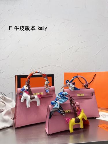 شنطة ارمز كيلي باكسسوارات ذهبي ( باحجام متعدده )