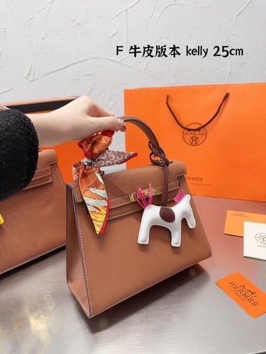 شنطة ارمز كيلي باكسسوارات ذهبي ( باحجام متعدده )