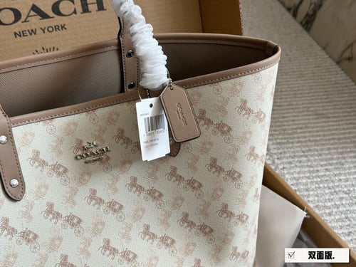 شنطة كوتش وجهين دبل فيس