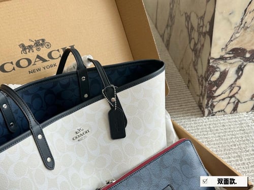 شنطة كوتش وجهين دبل فيس