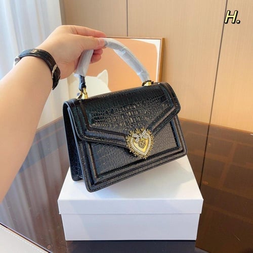 شنطة دولشي اند غابانا فضي