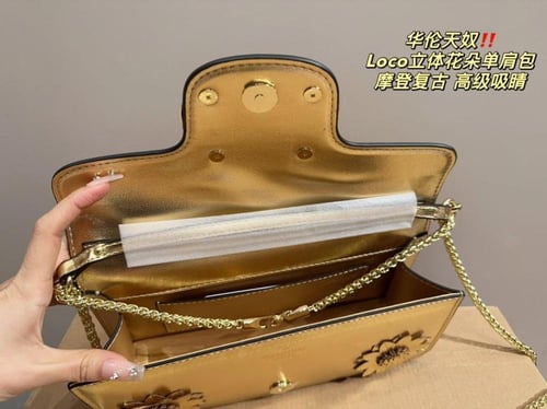 شنطة فالنتينو لوكو فضي