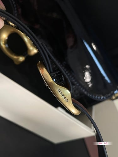 شنطة كوتش تابي لامع