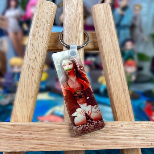 ميدالية مفاتيح نيزوكو مع تانجيرو من الجهتين