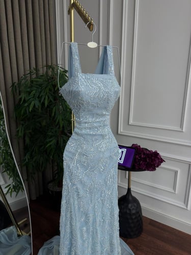 فستان ميلاف أزرق فاتح مطرز للسهرات والمناسبات الخا...