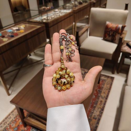 سبحة كهرمان حشري طبيعي – تدرجات بنية عسلية بطابع ع...