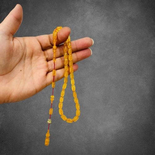 سبحة سندلوس نواعم بلون أصفر شفاف