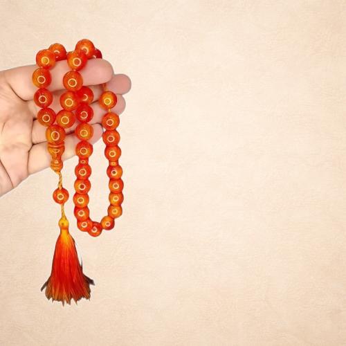 سبحة بكلايت الماني بلون برتقالي أحمر كروي