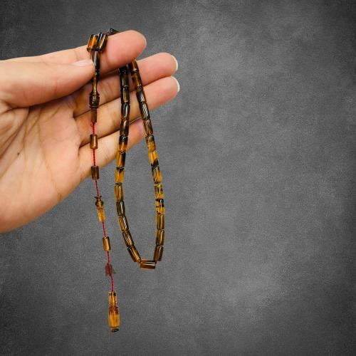 سبحة سندلوس نواعم قصة قلم بلون عسلي بني