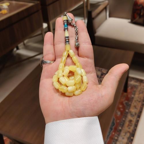 سبحة كهرمان طبيعي – تدرجات الحليب والليمون بلمسة ر...