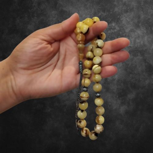 سبحة كهرمان طبيعي – تعرّجات عسلية بلمسة فاخرة