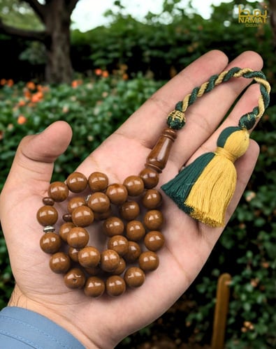 مسبحة مصنوعة من الباكليت مكونة من 33 حبة باللون ال...