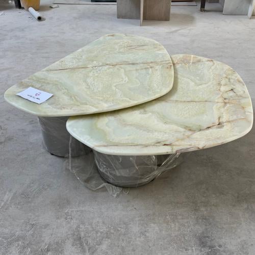 طاولات اونكس بقواعد حديد