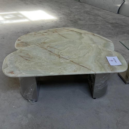 طاولات اونكس بقواعد حديد