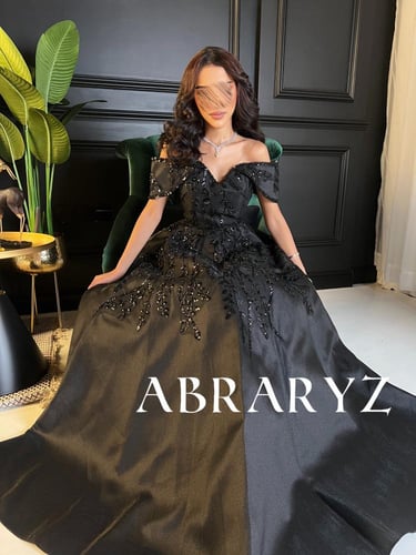 فستان سهرة طويل بتصميم أوف شولدر